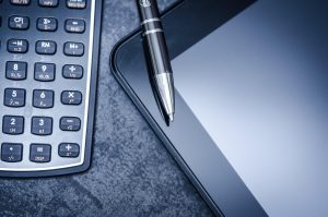 Tablet, calculator, business — Scale Your Agency with Expert White Label PPC Management
